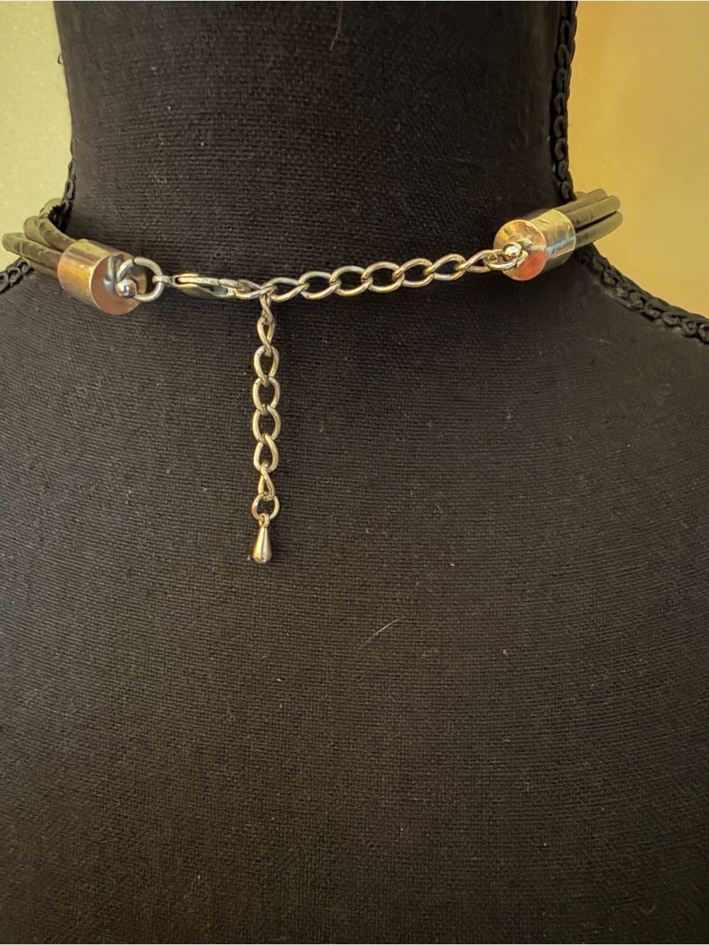 Handcrafted Silver-Tone Curved Tube Necklace with Black Cord - Picture 3 of 3